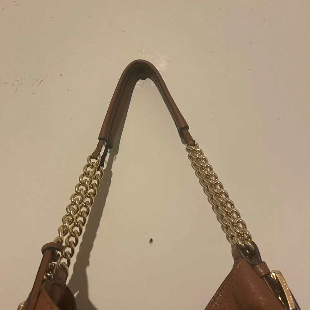 Michael Kors cognac pebbled leather hobo bag w hang tag